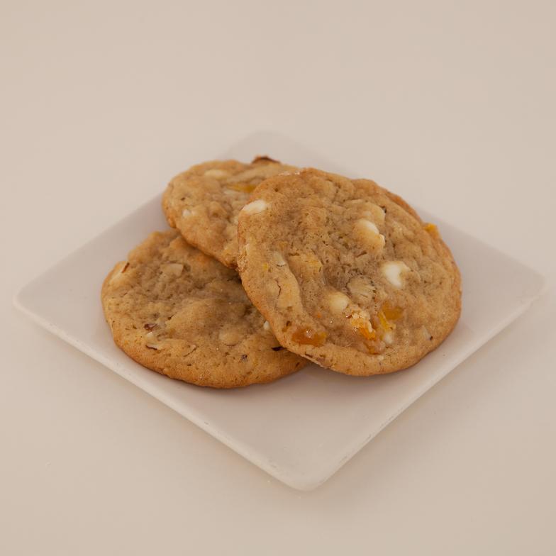 A sweet orange zest flavored cookie with nutty macadamias and white chocolate chips 